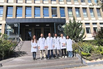 CETS 2026 practical session group in laboratory coats outside the Budapest Research Reactor building.